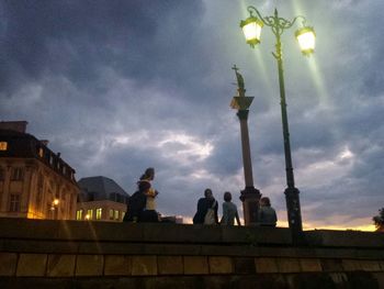 Low angle view of building against cloudy sky