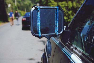 Ropes on car mirror