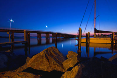 Bridge over river at night