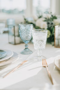 Glasses on table in restaurant