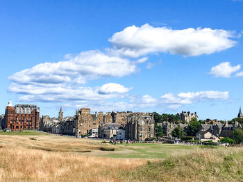 Buildings in city against sky