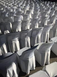 Full frame shot of empty chairs arranged outdoors