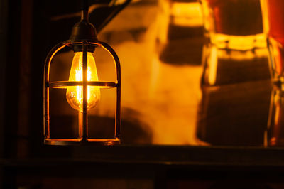 Close-up of illuminated light bulb