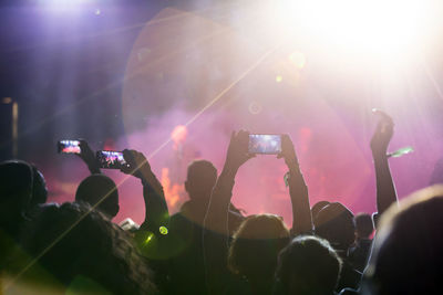 Group of people enjoying music concert