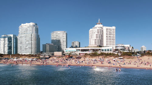 View of buildings in city at waterfront