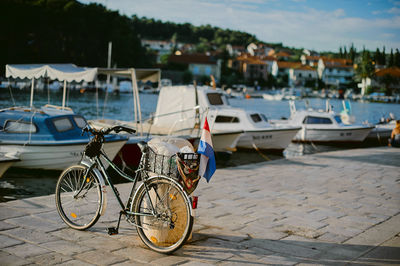 Bicycle moored at harbor