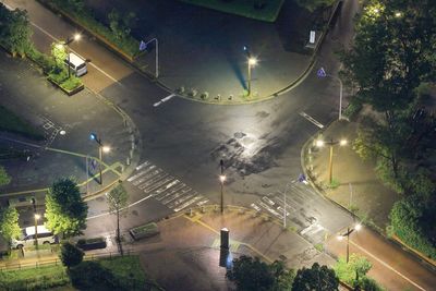 High angle view of empty roads in city at night