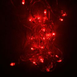 Close-up of illuminated christmas tree at night