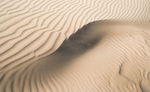 High angle view of sand dunes at beach