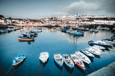 High angle view of boats moored in harbor