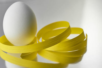 Close-up of yellow and white on table