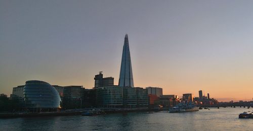 City lit up at waterfront