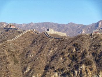 Panoramic view of mountain range against clear sky