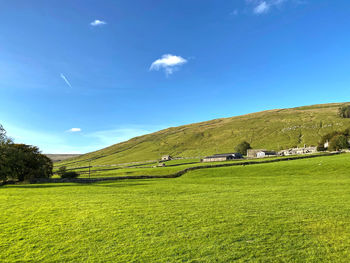 Rural landscape, near the village of halton gill, with stone cottages in, halton gill, skipton, uk