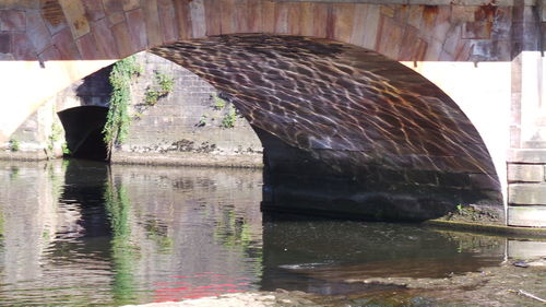 Arch bridge over river