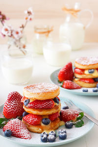 Mille feuille, close-up of french dessert on table with summer berry fruits and lemon curd.