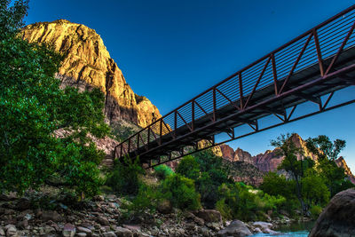 Low angle view of bridge against clear sky