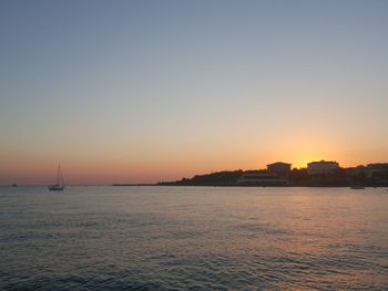 Scenic view of sea against sky during sunset