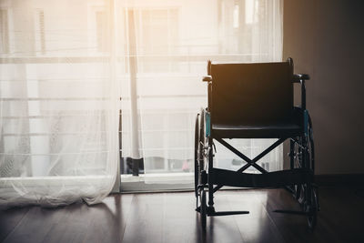 Empty wheelchair at home
