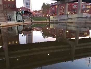 Reflection of buildings in puddle