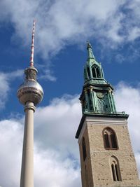 Low angle view of cathedral against cloudy sky