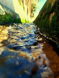 Surface level of water flowing through rocks