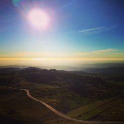 Scenic view of landscape at sunset