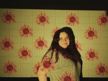 Portrait of woman standing on floor