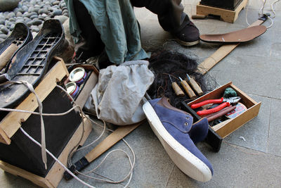 Low section of man working on floor