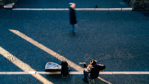 High angle view of people walking on street