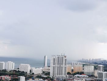 High angle view of buildings against sky