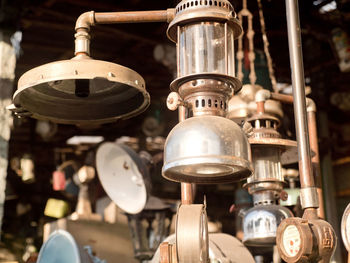 An old, vintage lamp with a shade in an antique store. antiquarian shop with old ancient lamps