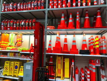 Traffic cones on shelves in store