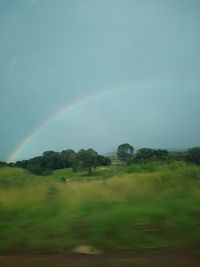 Scenic view of rainbow against sky