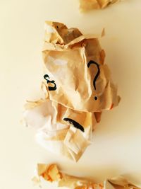 High angle view of stuffed toy against white background