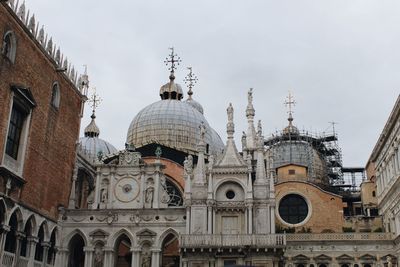 Low angle view of buildings against sky