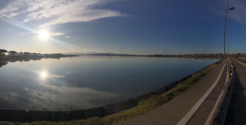 Panoramic view of lake against sky during sunset