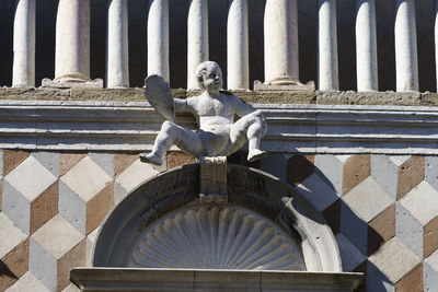 Low angle view of statue of historic building