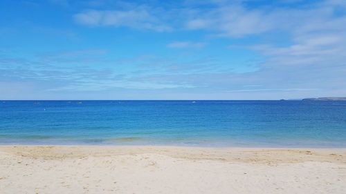 Scenic view of calm sea against sky