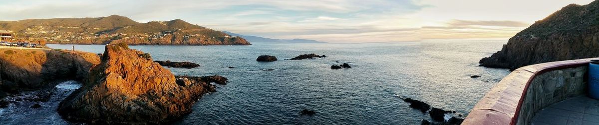 Panoramic view of sea against sky during sunset