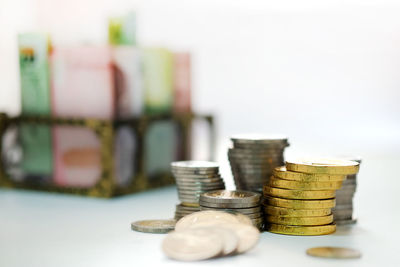 Stack of coins on table