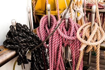 High angle view of ropes tied up to metal