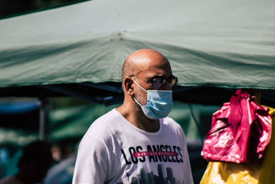 Portrait of man wearing mask