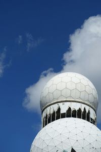 Low angle view of built structure against blue sky