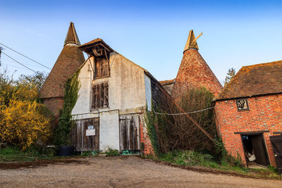 Low angle view of old building against sky