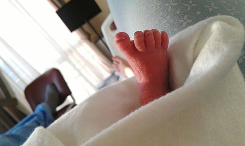 Low section of newborn baby at hospital