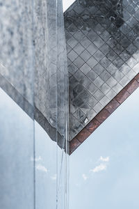 Low angle view of modern building against sky