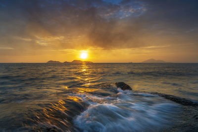 Scenic view of sea against sky during sunset