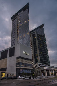 Low angle view of skyscraper against sky