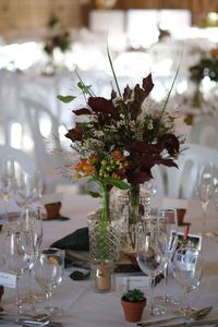 Flower vase on table in restaurant